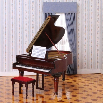 Concert grand piano with upholstered bench