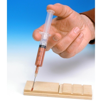 Wood glue in the dosing system, light brown