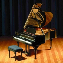 Concert grand piano with upholstered bench