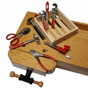 Tools on a wooden panel